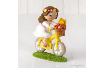 Figura pastel niña Comunión en bici